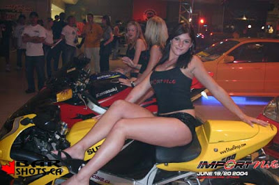 Hybrid technology, performed girls, racing hybrid, girl lying on top of the car and moto bike