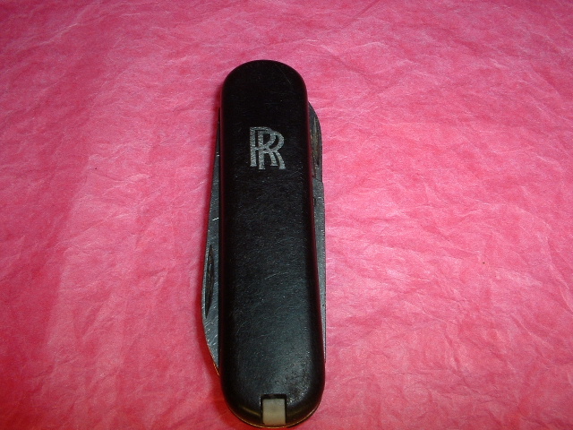  Classic with the luxury automobile manufacturer Rolls Royce logo on it