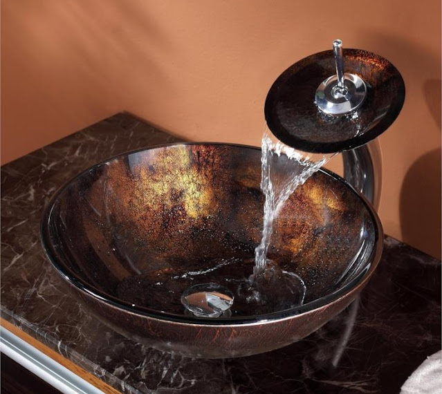 Copper look vessel sink for the bathroom.