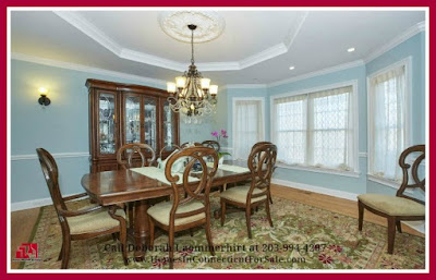 Take delight in the elegantly designed formal dining room of this Connecticut luxury homes for sale.