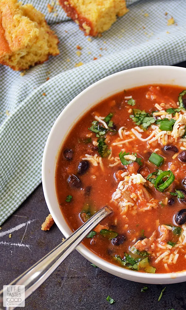 Slow Cooker Pumpkin Chili | by Life Tastes Good is everything you expect in a spicy chili recipe with the addition of slightly sweet and earthy pumpkin puree. Pumpkin is a wonderful addition to balance out all the flavors and take this chili recipe up a notch. #LTGRecipes #RHFood