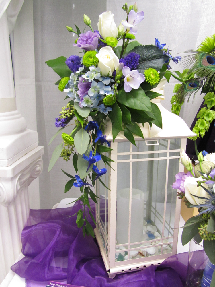 Keeping with the beach theme is this lantern arrangement beach wedding 