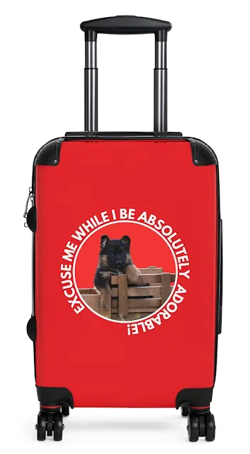 Travel Suitcase With Cute Black and Red German Shepherd Puppy Sitting on the Toy Wooden Tractor and Caption Excuse Me While I Be Absolutely Adorable