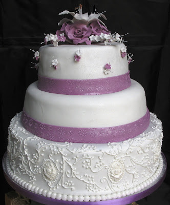 Three tier custom round white fondant elegant unique wedding cake