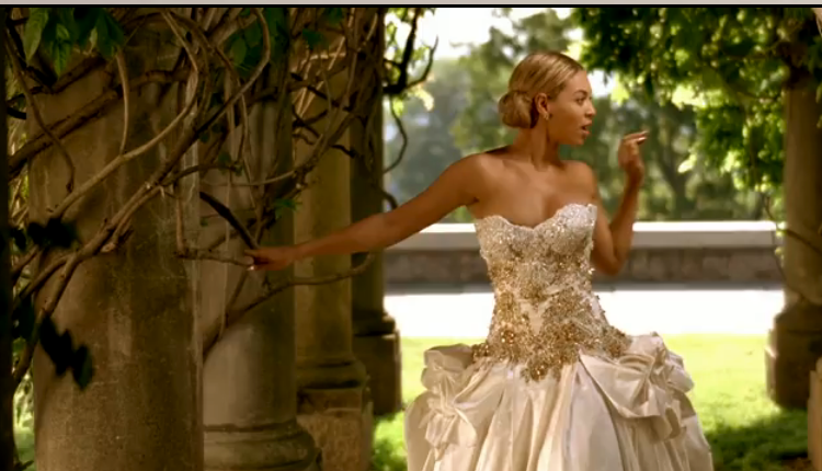 I have received many emails asking who made Beyonce's wedding dress in her