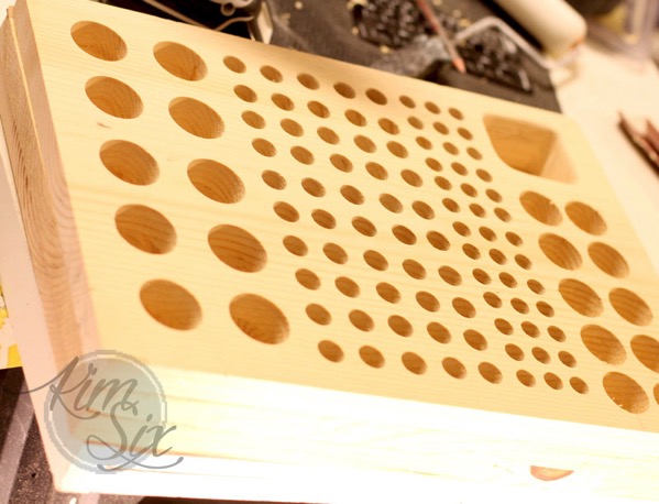Boring holes into thick slab of wood