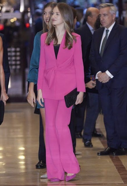 Queen Letizia wore a black dress by Teresa Helbig. Princess Leonor wore a pink suit. Infanta Sofia wore a green dress by The Are