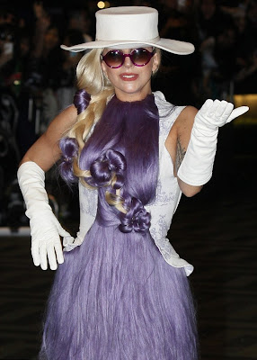 Lady Gaga Hits Hong Kong In A Gown Made Of Purple Hair