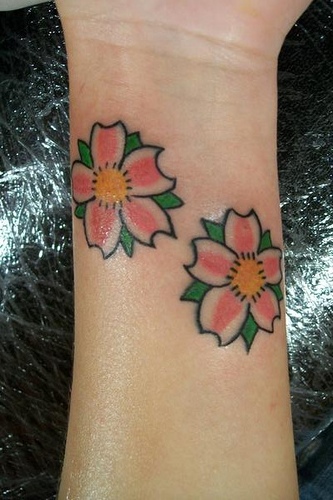 Cool Japanese Cherry Blossom Tattoo On Wrist | Ink Body Tattoo