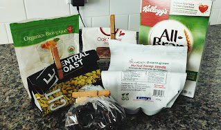 Muesli ingredients in plastic packaging on a countertop