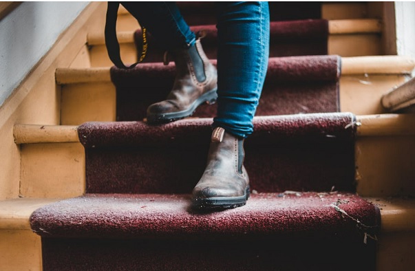 Image showing a guy is going down flight of stairs