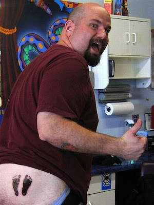 Unusual tattoos on butt