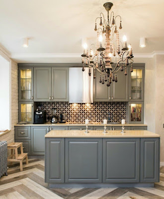 Chandelier above kitchen island for Mediterranean kitchen design