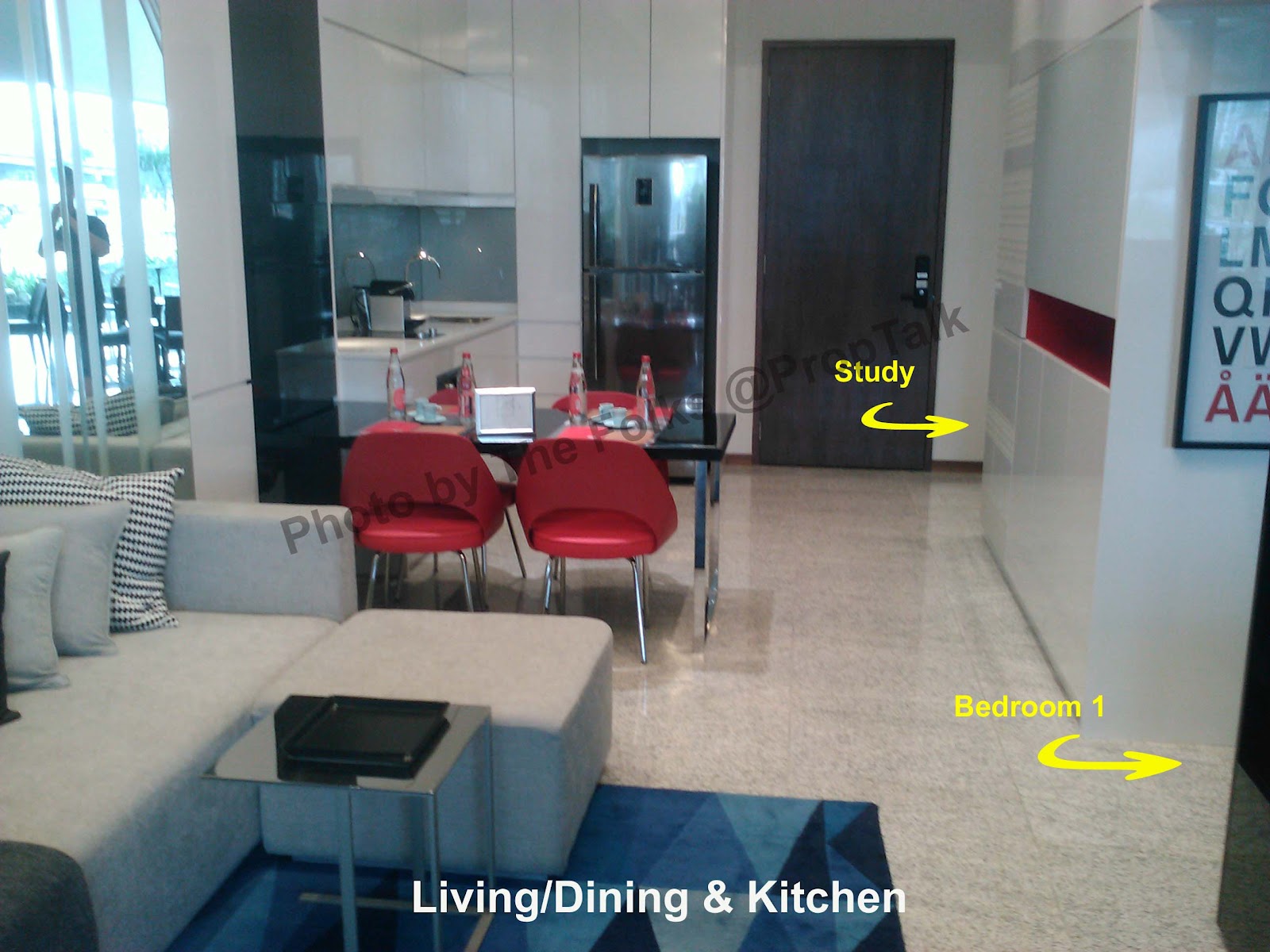 The living/dining/kitchen area is surprisingly spacious for an unit of  title=