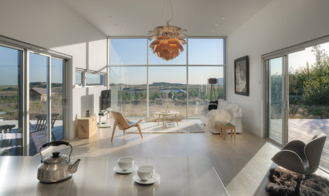 Modern living room with glass wall