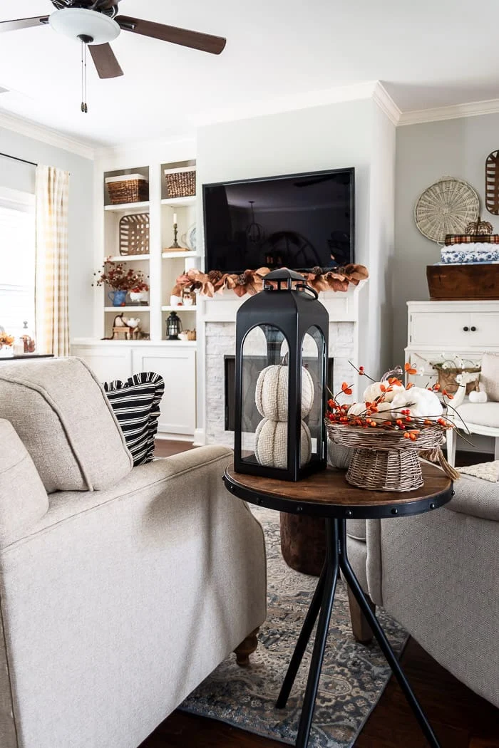 living room, black lantern, pumpkins