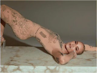 Khloe Kardashian Wears Sheer Nude Catsuit Covered In Tattoo Prints: Photos
