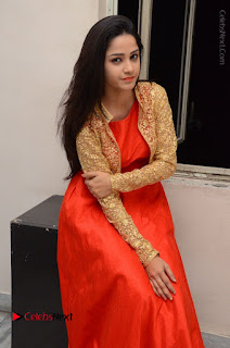 Telugu Actress Divya Nandini Stills in Orange Sleeveless Gown at Chennai Chaitrama Movie le Launch Event  0098.JPG