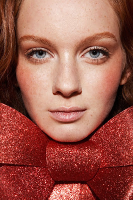 christmas beauty, woman wearing giant bow