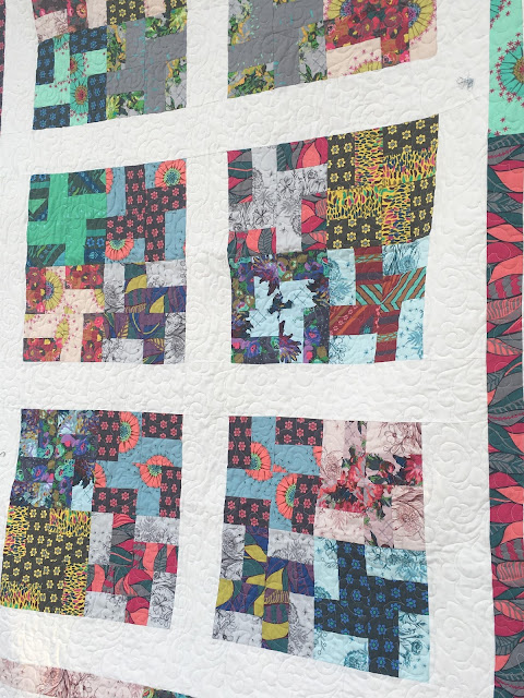 Quilt from Anna Maria Horner's Mod Corsage fabric line pattern from Strip Savvy Book