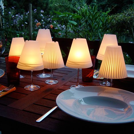 These parchment lampshades easily slip over your wine glasses to transform