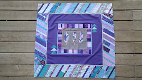 Aqua and purple feather round robin quilt