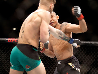   mcgregor knocks out aldo, mcgregor aldo knockout slow mo, mcgregor aldo knockout gif, 13 second knockout ufc, aldo mcgregor 13 seconds, mcgregor knocks out alvarez, best mcgregor knockout, mcgregor mma knockout, top mcgregor knockouts