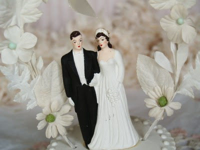 And the ultimate white vintage wedding cake toppers