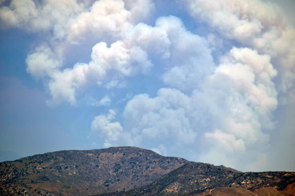 A snapshot of a huge smoke cloud bellowing from the Apple Fire in Riverside County...as seen from Ontario, California, on August 1, 2020.