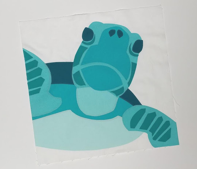 Sea Turtle quilt block made with Kona aqua and teal solids and Aurifil thread