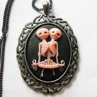 Conjoined twin necklace cameo