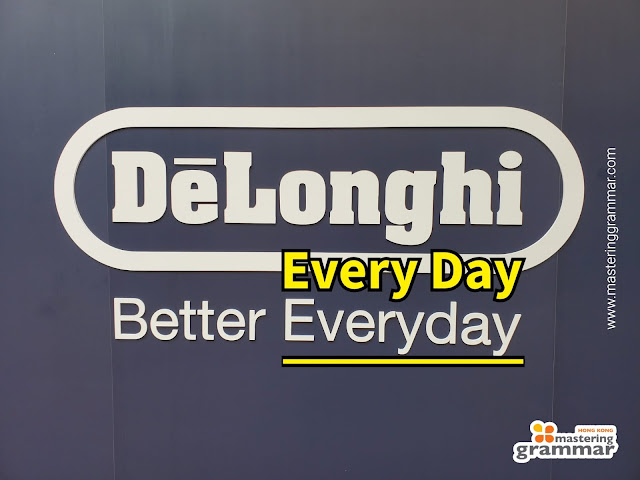 A DeLonghi poster showing the company's slogan, 'Better Everyday'. Here, the word 'everyday' should have been written as two separate words.