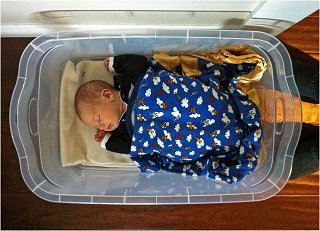 Image: Baby sleeping in a Rubbermaid bin, by Jeff_Werner, on Flickr