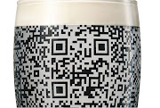 The QR code is printed on the glass, and only works when Guinness (or .