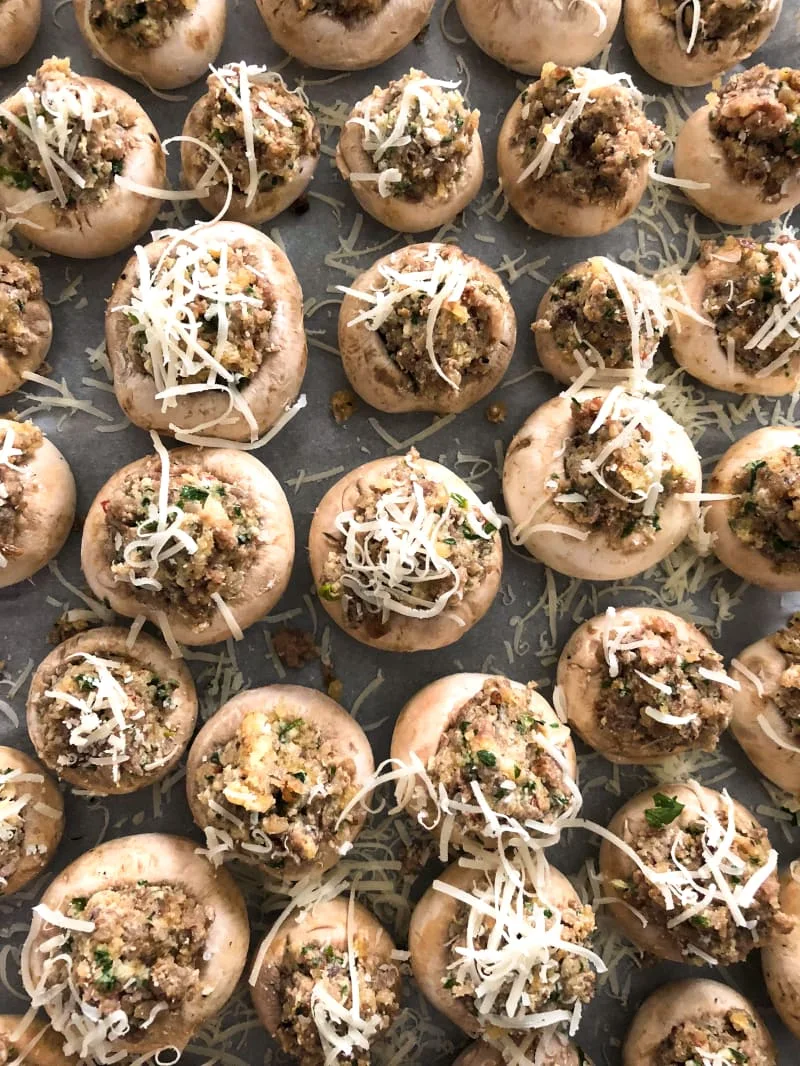 The Best Sausage Stuffed Mushrooms are cheesy and tender on the inside and have a golden crust on the outside.  This recipe is a classic that you will want to make again and again! #appetizer #mushrooms #sausage