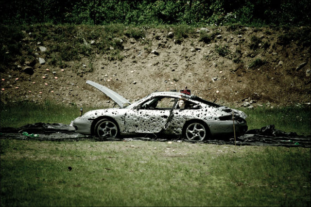 Porsche 911 Gets Shot up with Weapons