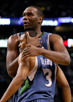 Timberwolves Players hugging on the court