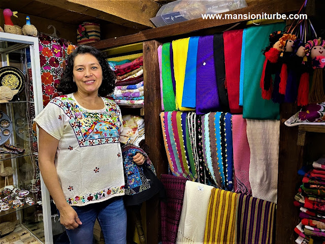 Sandra Lopez at the Store at the House of the Eleven Patios