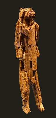 The lion man from the Stadel Cave in Hohlenstein, Lonetal.        The Lion Man sculpture stands as a testament to the ingenuity and creativity of our ancient ancestors. This enigmatic archaeological wonder, crafted from mammoth ivory, captures the imagination with its intricate details and mythical aura. In this paper, we will explore the origins, significance, and mysteries surrounding the Lion Man sculpture, Front