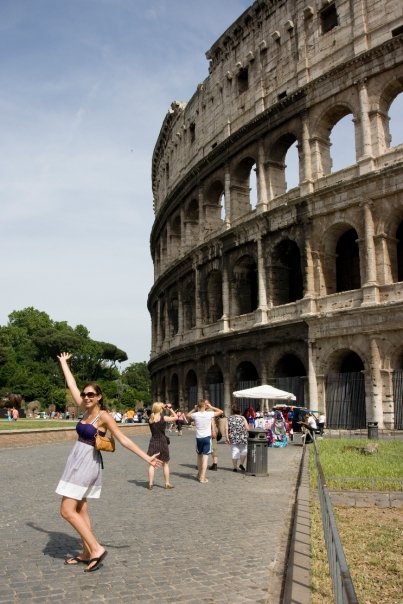 Amy West in front of the Colosseum in Rome
