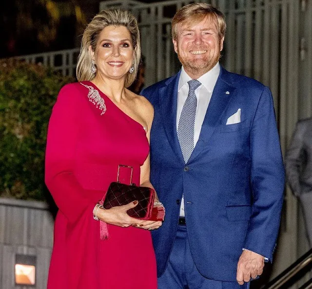 Queen Maxima wore a one-shoulder red gown by Claes Iversen. President of Greece Katerina Sakellaropoulou and Pavlos Kotsonis