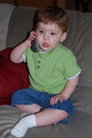 Two People Talking On The Phone. The boys talking on the phone