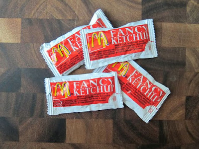 McDonald's Fancy Ketchup packets.