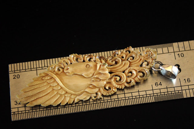 Fosil Carving Pendant