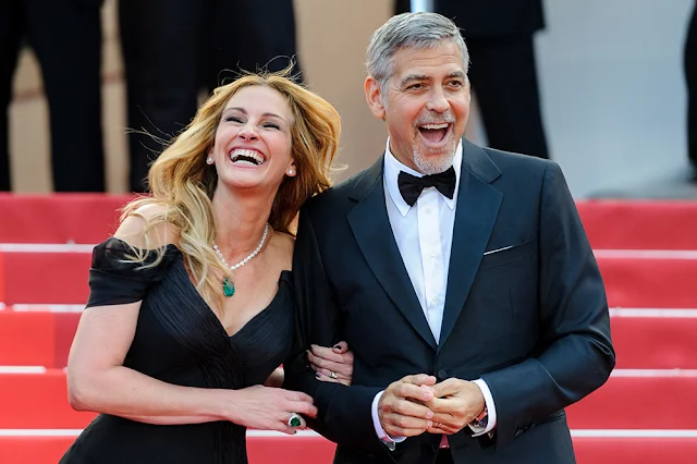 Julia Roberts and George Clooney share a laugh at the ‘Money Monster