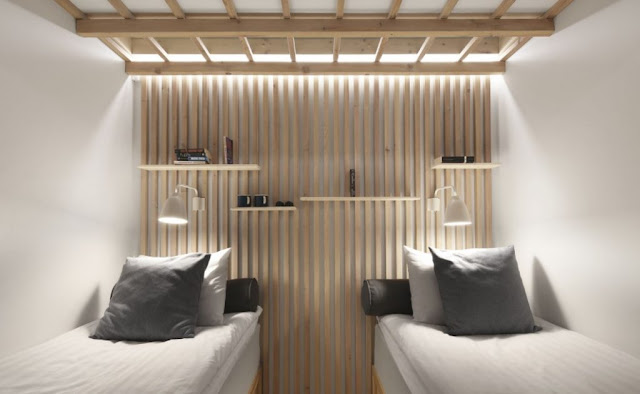 minimalist 3x4 hotel room design with two beds