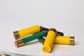 Shotgun shells of several gauges.
