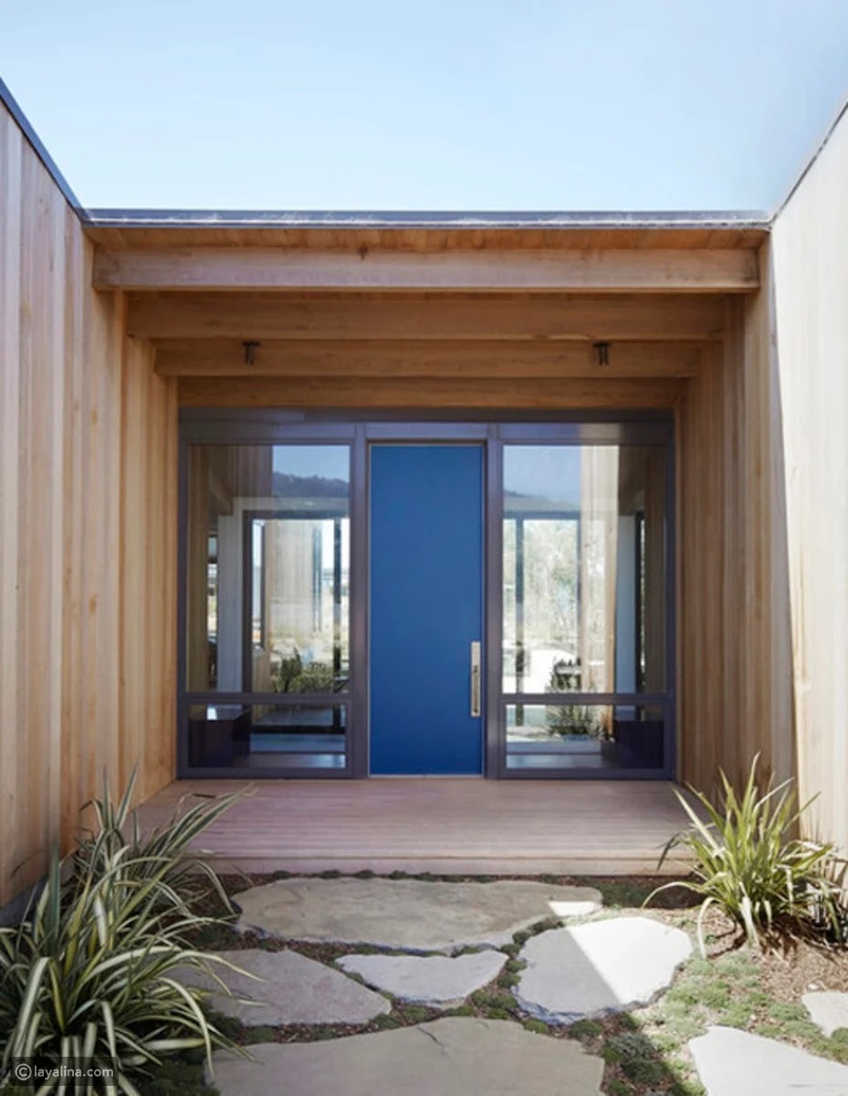 Modern exterior doors 2022-2023 Modern exterior doors play a vital role in providing comfort and security and enhancing the appearance of your home. Exterior doors require a certain amount of care and maintenance to keep the materials durable for the long term. In this article, get to know with us the most prominent designs of modern exterior doors for 2022.  Modern exterior doors 2022: The general rule for designing modern exterior doors is to choose a front door that matches the general appearance of your home and the conditions of the area. [1] Modern exterior doors will come in different shades of gray or black with shades of blue while the traditional brown and red finishes are still going strong for 2022. In 2022 people will choose exterior doors in bold and bright colors such as deep purple, bright yellow and orange.  Exterior doors are trending in 2022 using low-cost fiberglass and hardwood because they are more efficient and more sustainable. The 2022 cold zone housing companies can use solid wood clad doors with a polycarbonate insulated core that requires no additional weatherproofing material. The hot trend for exterior doors in 2022 is adding high-end brushed metal and bronze finishes to door handles. Add a smart lock for the exterior door with smart video cameras and rather inexpensive alarms. It can be placed near your front door to monitor your entrance at all times. Oversized front doors have become a trend in modern design that automatically make homes look big, making a strong first impression.  Modern iron exterior doors: Iron is a great choice for exterior door design, as it accommodates custom glass panels to let in natural light, and is one of the safest types of modern exterior door materials.  Modern iron exterior doors combine vertical bars with ornate decorations such as geometric shapes. An external zippered iron door sits on a custom rail and opens to a smooth side. Such a door is used for large houses and garages. Wrought iron doors are filled with high quality heat insulating materials to keep your home warm in winter and cool in summer.  Wooden exterior doors: Wooden doors are the ideal choice for many homes and are often viewed as the most desirable exterior door material thanks to their aesthetic design.  Dutch doors are an excellent option for those who have pets, opening from the top and bottom separately. Stylishly designed solid wood front doors help you maintain maximum privacy. The wooden front door with wrought iron frame glass grilles allows sunlight into the house.  Modern exterior doors made of the finest types of mahogany veneer combined with solid wood pieces designed with an engineered technology that reduces the leakage of outside noise into the house. Simple folding exterior wooden doors have more than one door attached with hinges. You can choose to fold it completely to open the entrance or close one to restrict entry. Folding doors are ideal for exterior designs due to their ease of use and low maintenance. Modern exterior doors are a luxurious addition to home decor and increase the level of security and protection for the home, especially when using iron or steel doors. Design the exterior door using your desired style, measurements, color and materials.