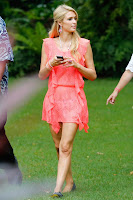Paris Hilton wearing a bright pink dress