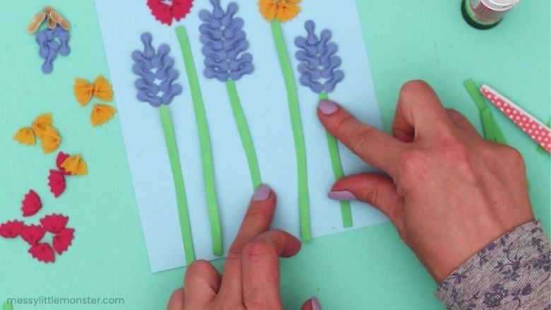 How to make a painted pasta flower craft for kids
